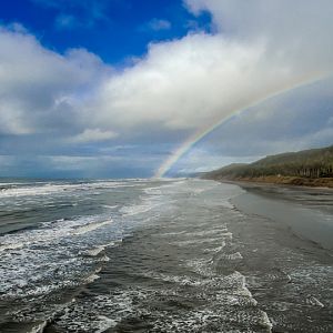 Olympic Peninsula, Washington State. Saw the rainbow as we were driving down the highway