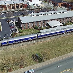 Aerial View of Amtrak #74 Carolinian Arriving & Departing Main St. Station - Burlington, NC