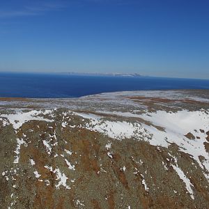 Diomede Island - over the top - US Mainland in the bacground