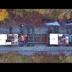 Aerial View of Railroad Spike Pullers/Inserters & Ballast Regulator at Work